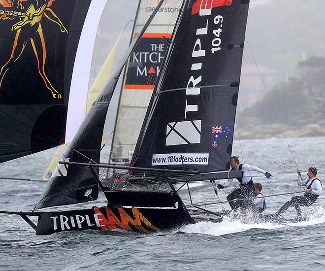 The Triple M team fall back into the water when the breeze left them - 18ft Skiffs - JJ Giltinan Championship 2017 © 18footers.com